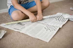 1. Roll the newspaper sheet
